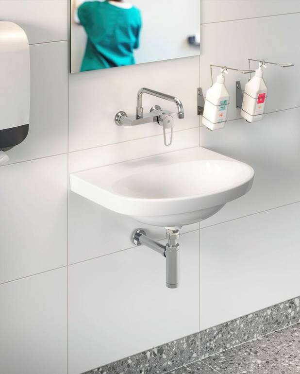 Nautic 5560 badeværelsesvask – til montering med bolte, 60 cm - Optimeret til brug på hospitaler
Forseglet overløb
Uden huller til beslag